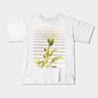 Bright young lemon tree with white blinders background. Vegan lifestyle Kids T-Shirt